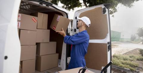 delivery man holding pack