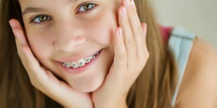 How to Help Your Kid Get Used to and Look After Their Braces